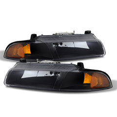 1996-2000 Plymouth Breeze Black Headlight